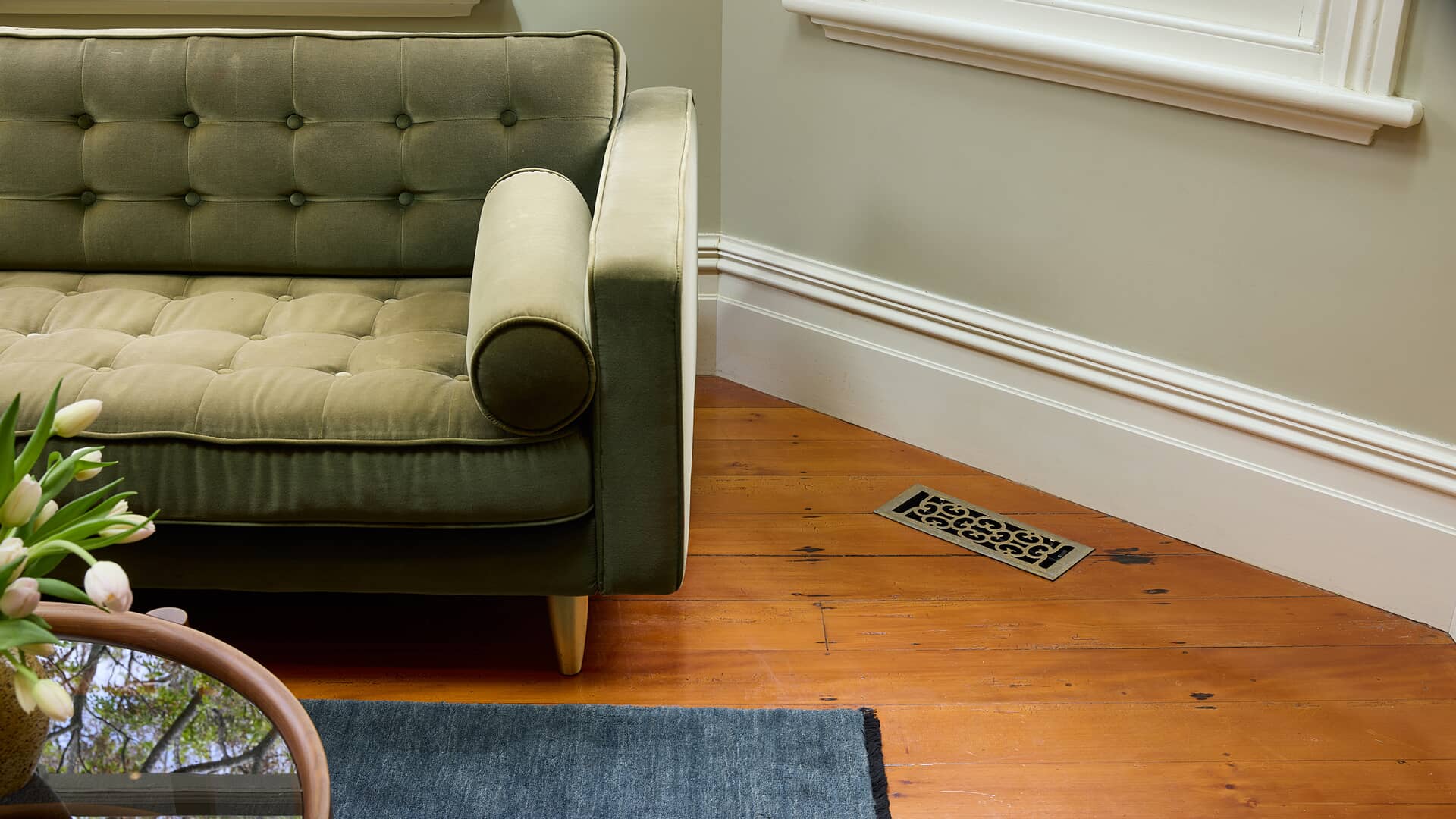 Under-floor ducted air conditioning outlets installed within the home.
